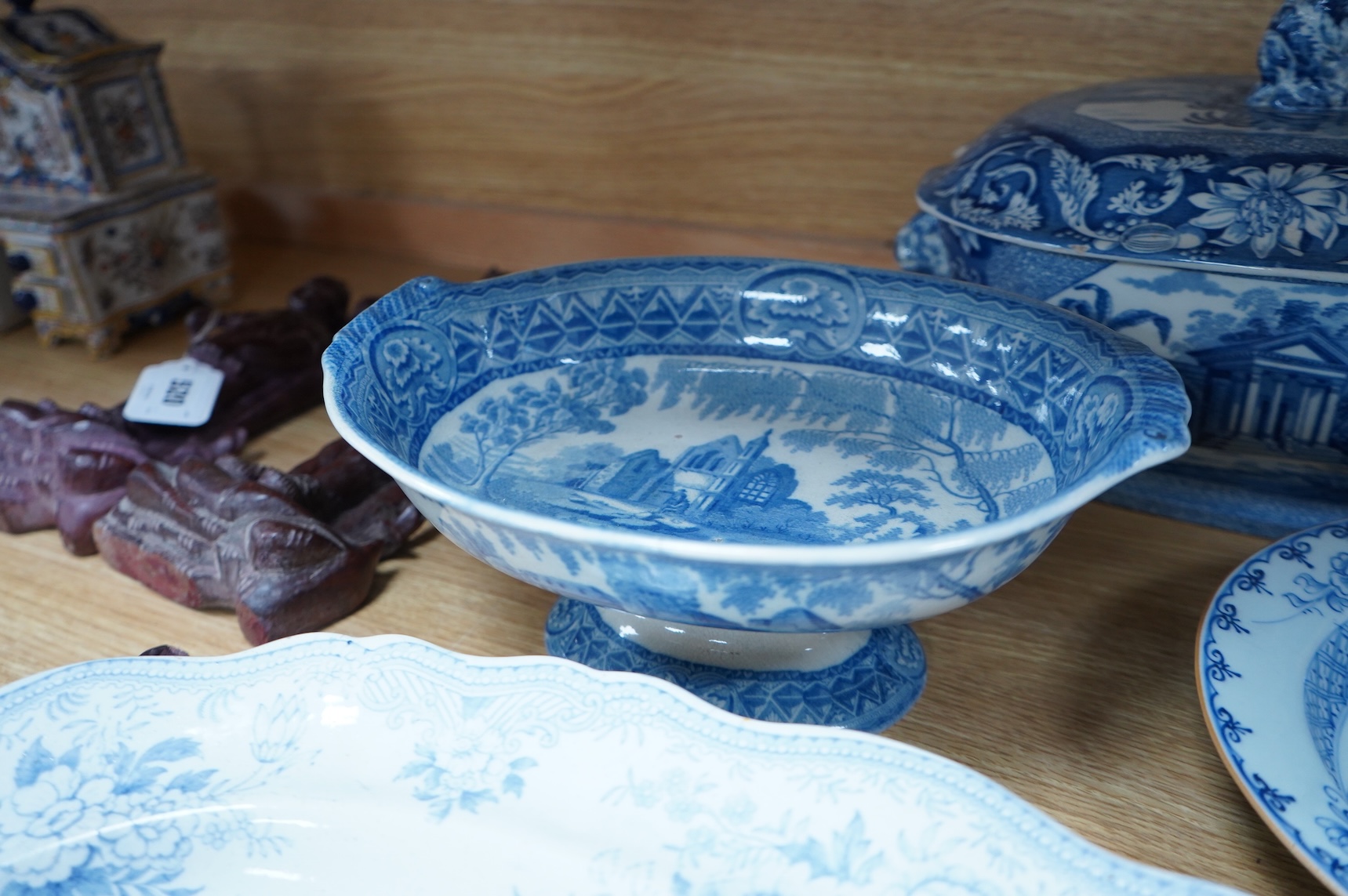 A group of Victorian blue-printed dinner wares, including a Chinese blue and white dish and a Wade bird (13).